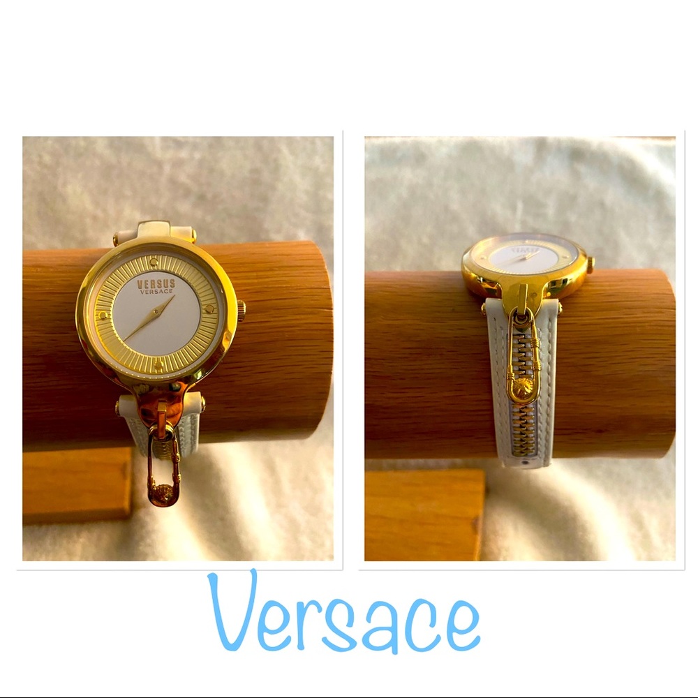 Versace leather and gold band watch, whiteish colored band, gold and white face